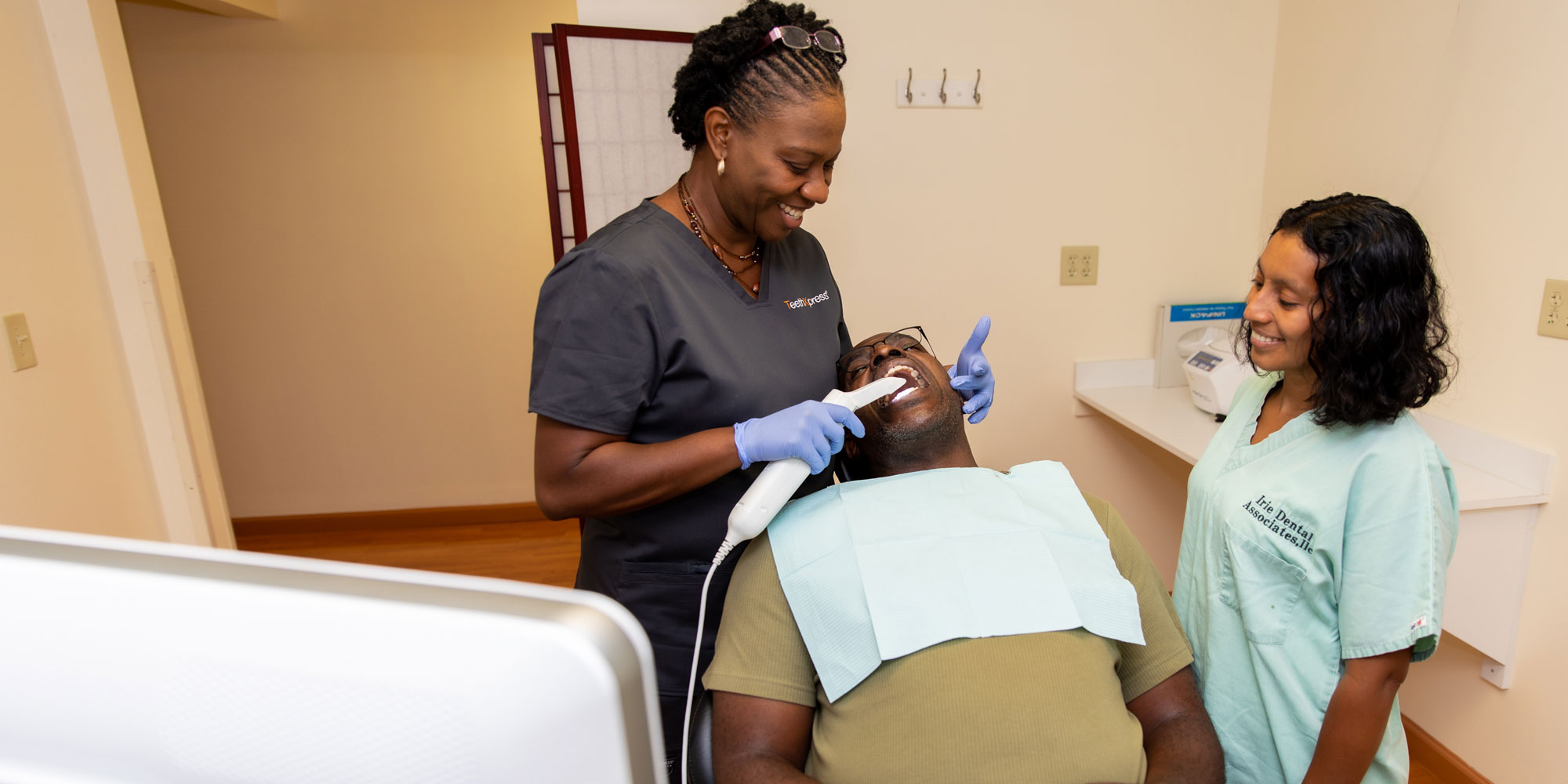 dr edwin performing dental procedure